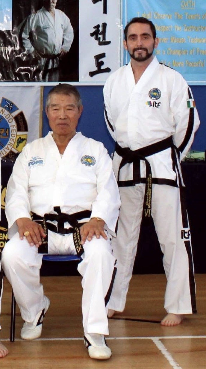 Richard Cassidy with Grand Master Rhee Ki Ha IX Dan
